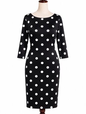 Polka dot whimsical scuba midi dress. Hits in the right spots. 14